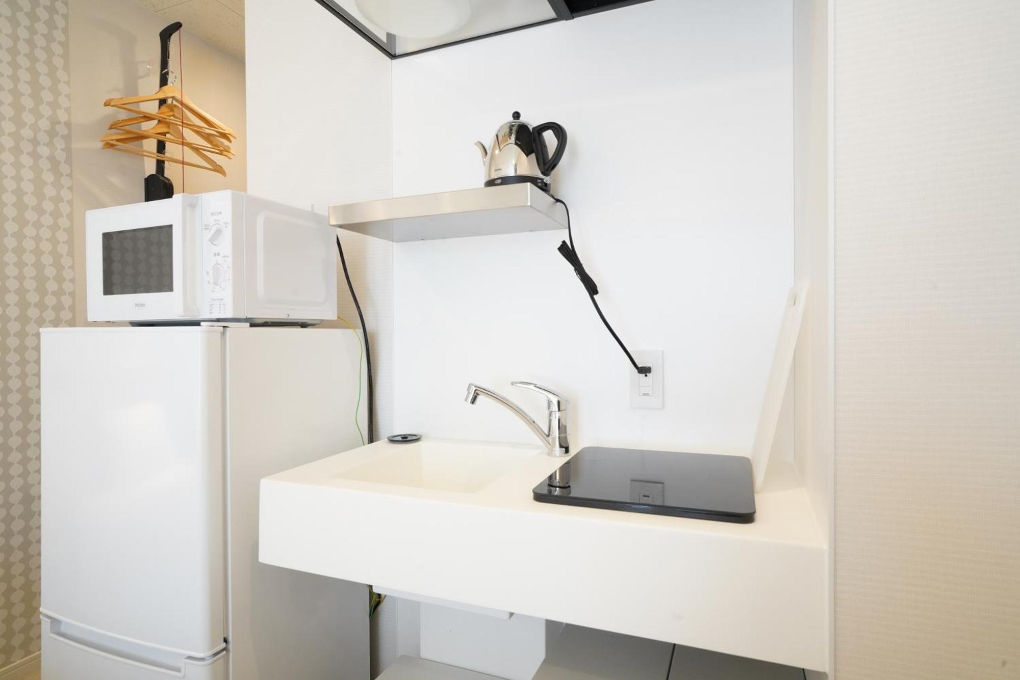 U-Hotel Takadanobaba طوكيو الغرفة الصورة