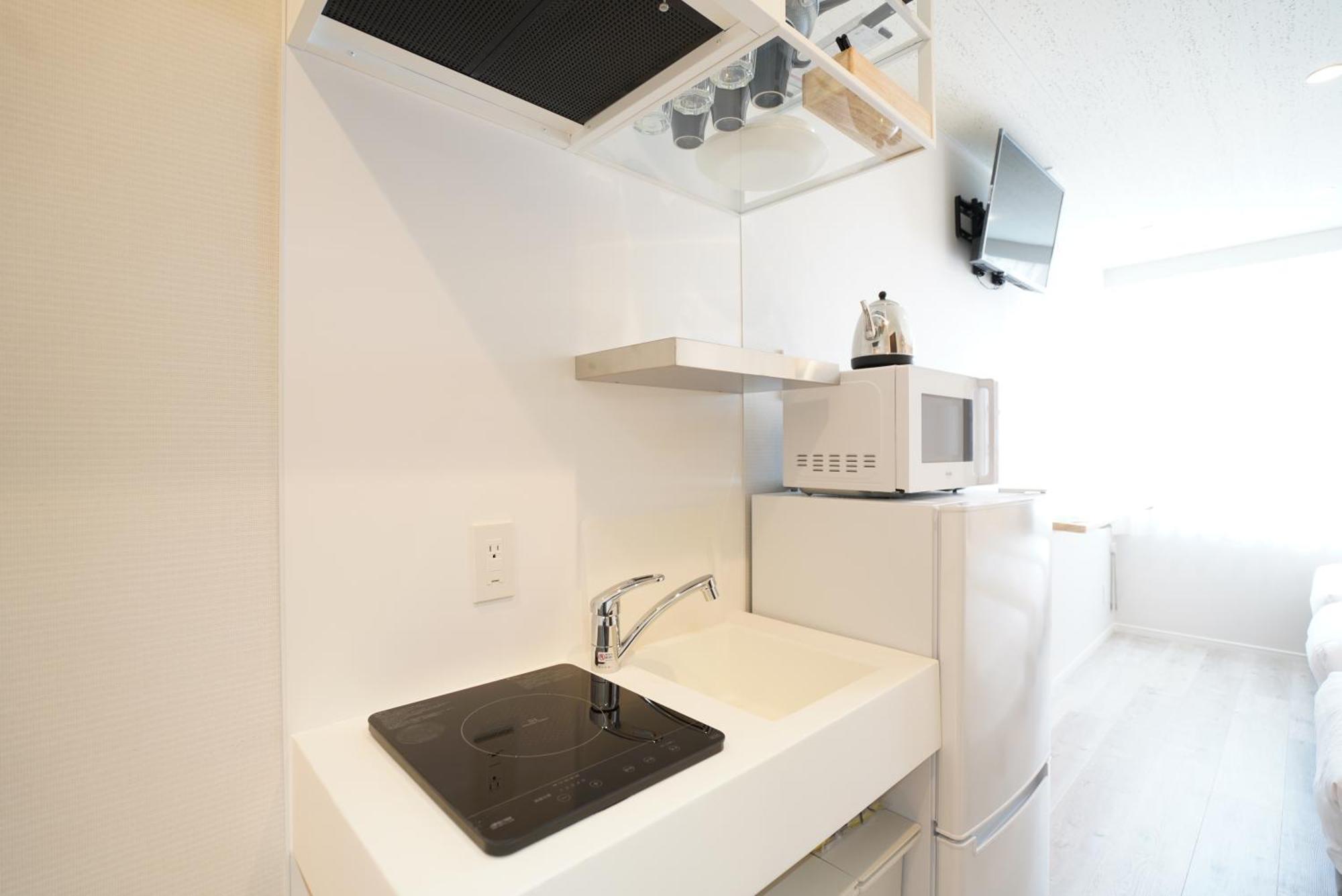 U-Hotel Takadanobaba طوكيو الغرفة الصورة