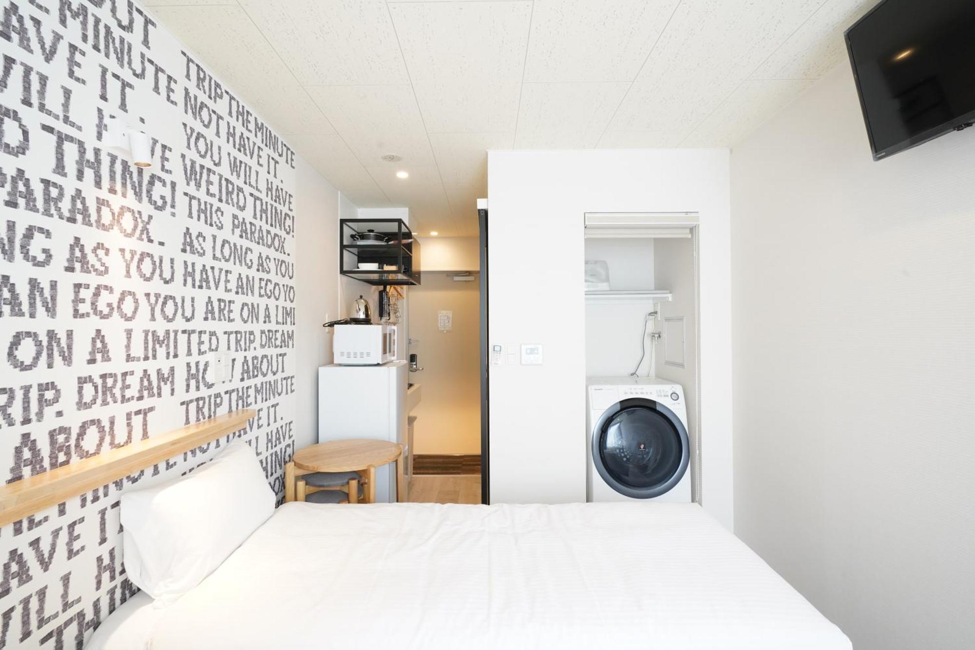 U-Hotel Takadanobaba طوكيو الغرفة الصورة